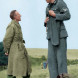 A British soldier speaking with a rather tall German soldier-prisoner
